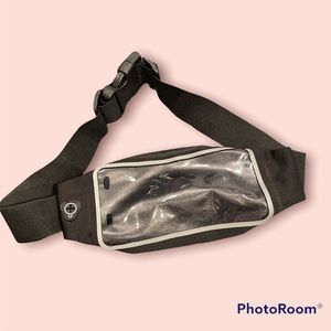 Phone waist carrier with headphones opening